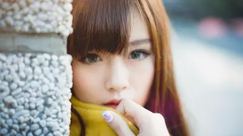 海莉斯莫取消北京演唱会