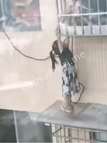 吴玉梅救坠楼女童